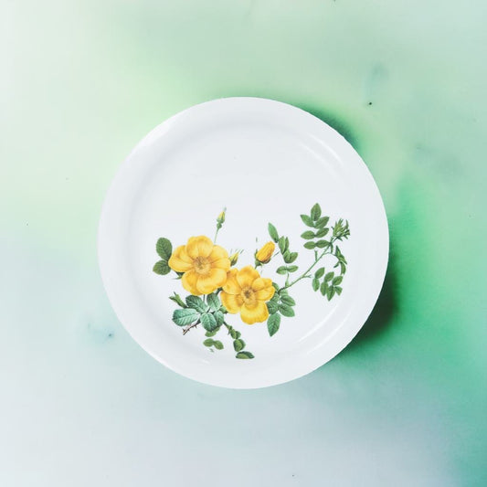 Elevate your dining experience with our Sun Floral Plate collection. They are crafted from durable plastic.
