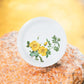 Elevate your dining experience with our Sun Floral Plate collection. They are crafted from durable plastic.