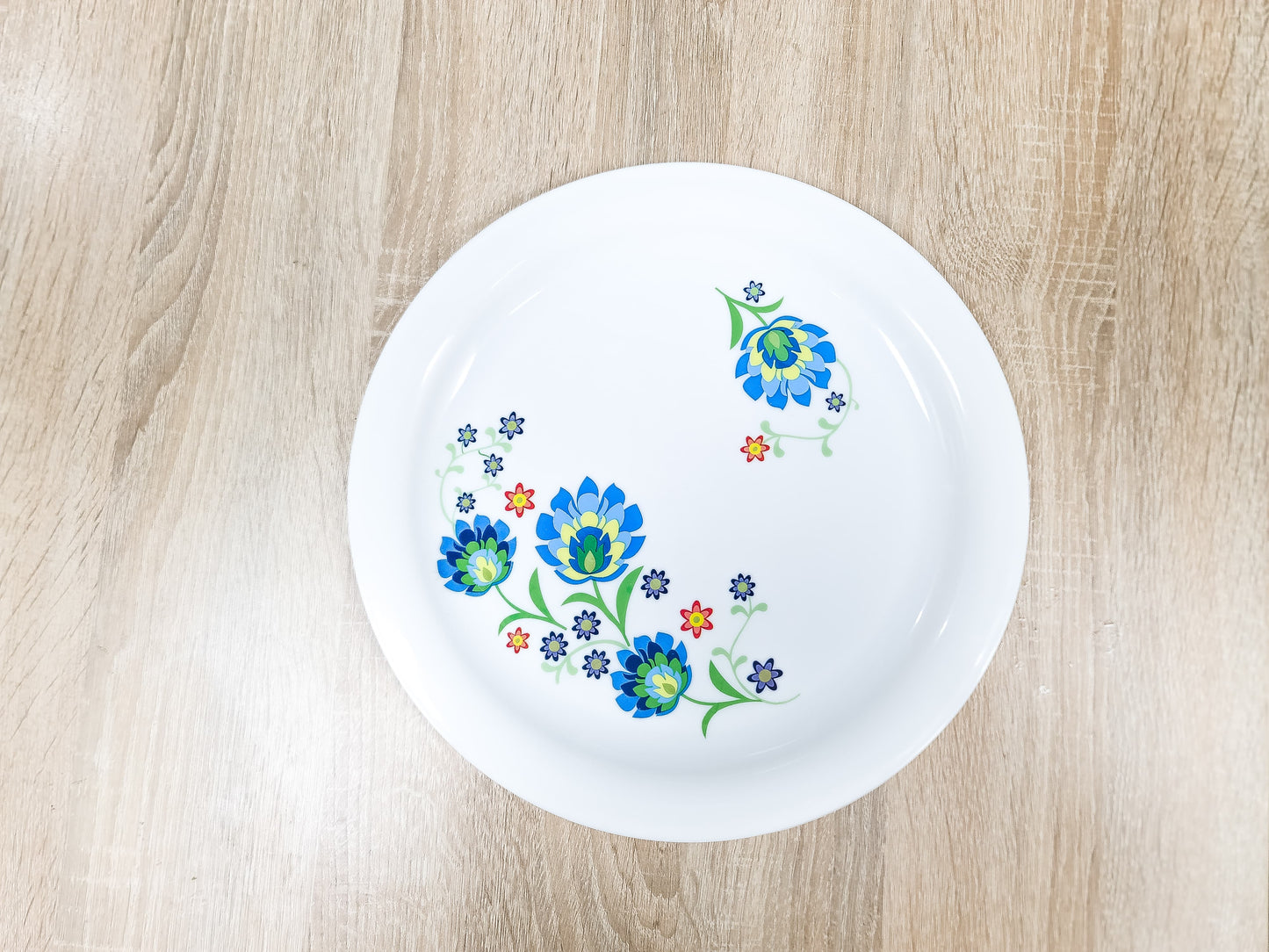 Elevate your dining experience with our Blue Floral Plate collection. They are crafted from durable plastic.