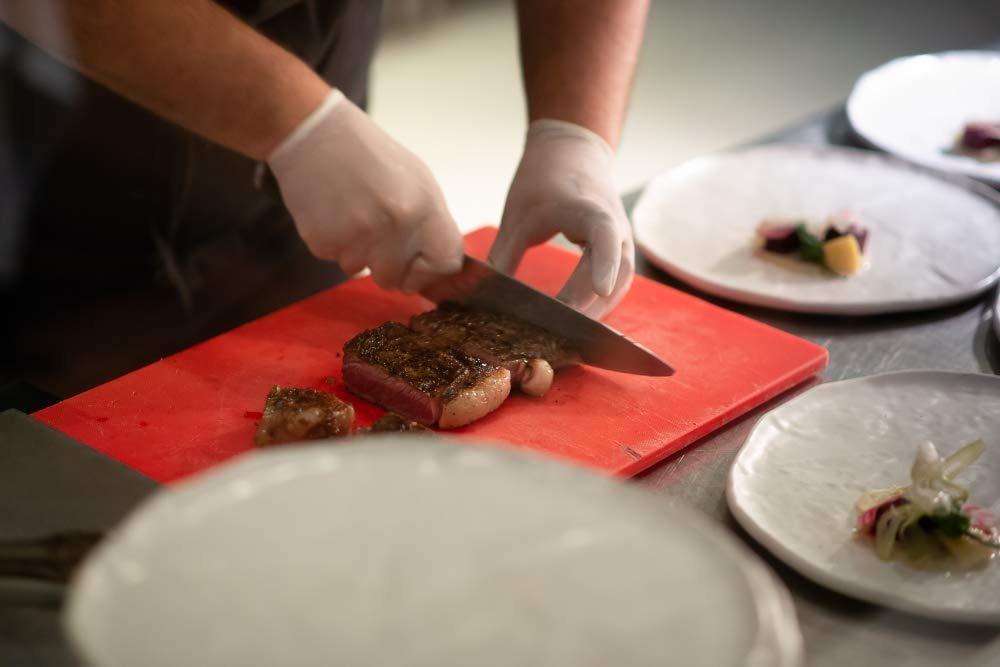 Our Plastic® Cutting Chopping Board! Crafted for kitchen convenience, this durable board boasts an extra thickness for stability and a non-slip. Red Color.